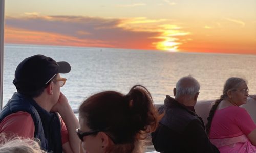 Friends enjoying a sunset cruise Fort Myers beach